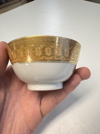 A pair of Chinese gilt-decorated sepia 'Riverscape' cups and saucers, Jiaqing