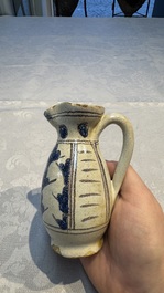 A rare intact early Italian maiolica ewer inscribed 'G', Montelupo, 15th C.