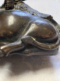 A Chinese bronze 'Boy and Buffalo' paperweight, Ming