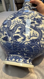 A Chinese blue and white moonflask vase with dragons, 'bianhu', Qianlong mark, Republic