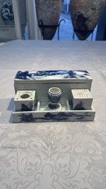 A rare Chinese blue and white 'Mountainous Landscape' writing set with an inkwell, sander and candlestick, Qianlong