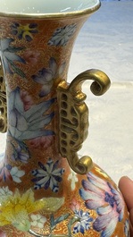 A pair of Chinese famille rose 'Millefleur' vases, Qianlong mark, Republic