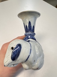 Two Chinese blue and white recumbent elephant-form candlesticks, Jiaqing
