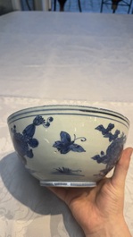 A Chinese blue and white 'Butterflies and Flowers' bowl, Transitional period
