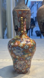 A pair of Chinese famille rose 'Millefleur' vases, Qianlong mark, Republic