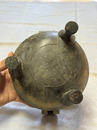 A Chinese archaic bronze tripod food vessel and cover, Ding 鼎, Eastern Zhou