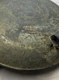 A Chinese archaic bronze tripod food vessel and cover, Ding 鼎, Eastern Zhou