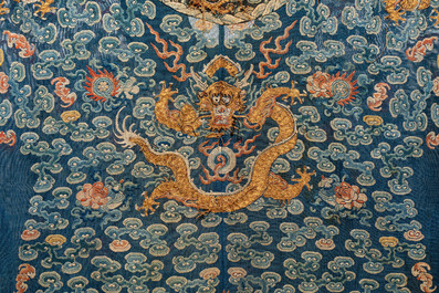 A Chinese silk blue-ground summer gauze 'Dragons' robe, 19th C.