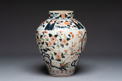 A large Japanese Imari baluster vase with floral relief design, Edo, ca. 1700