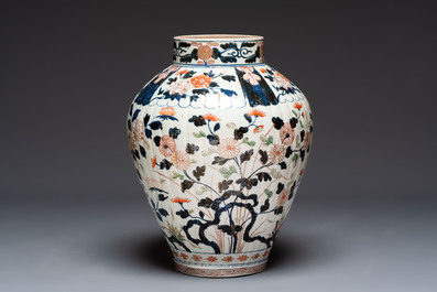 A large Japanese Imari baluster vase with floral relief design, Edo, ca. 1700