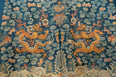A Chinese silk blue-ground summer gauze 'Dragons' robe, 19th C.
