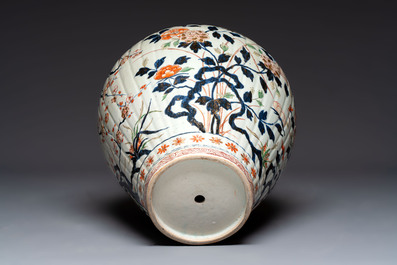 A large Japanese Imari baluster vase with floral relief design, Edo, ca. 1700