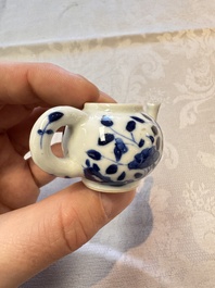 A Chinese blue and white vase, a pair of miniature vases, a covered teapot and a covered box, Kangxi and artemisia leaf mark, Kangxi