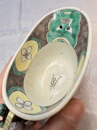 A pair of Chinese verte biscuit libation cups, 19th C.