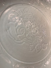 A rare and large Chinese Longquan celadon dish with floral design, Ming, early 15th C.