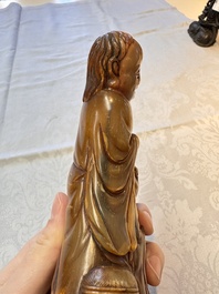 A Chinese carved buffalo horn 'Hehe Erxian' group, 17/18th C.