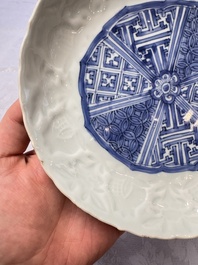 A fine Chinese blue and white moulded Kraak porcelain dish with incised 'Pomegranates' rim, Wanli