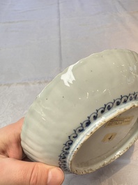 Four Chinese 'Kraak' blue and white plates with a bird on a rock, Wanli