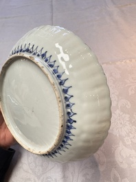 Four Chinese 'Kraak' blue and white plates with a bird on a rock, Wanli