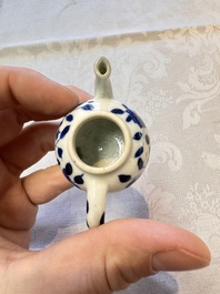 A Chinese blue and white vase, a pair of miniature vases, a covered teapot and a covered box, Kangxi and artemisia leaf mark, Kangxi