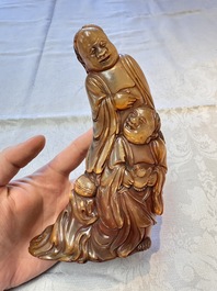 A Chinese carved buffalo horn 'Hehe Erxian' group, 17/18th C.