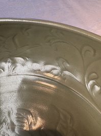 A rare and large Chinese Longquan celadon dish with floral design, Ming, early 15th C.