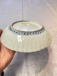 Four Chinese 'Kraak' blue and white plates with a bird on a rock, Wanli