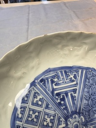 A fine Chinese blue and white moulded Kraak porcelain dish with incised 'Pomegranates' rim, Wanli