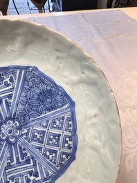 A fine Chinese blue and white moulded Kraak porcelain dish with incised 'Pomegranates' rim, Wanli