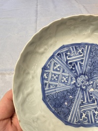 A fine Chinese blue and white moulded Kraak porcelain dish with incised 'Pomegranates' rim, Wanli