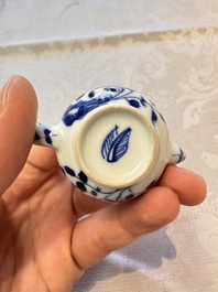 A Chinese blue and white vase, a pair of miniature vases, a covered teapot and a covered box, Kangxi and artemisia leaf mark, Kangxi