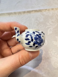 A Chinese blue and white vase, a pair of miniature vases, a covered teapot and a covered box, Kangxi and artemisia leaf mark, Kangxi