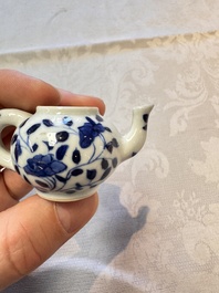 A Chinese blue and white vase, a pair of miniature vases, a covered teapot and a covered box, Kangxi and artemisia leaf mark, Kangxi
