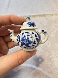 A Chinese blue and white vase, a pair of miniature vases, a covered teapot and a covered box, Kangxi and artemisia leaf mark, Kangxi