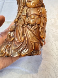 A Chinese carved buffalo horn 'Hehe Erxian' group, 17/18th C.