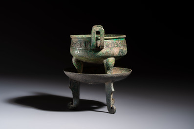 An inscribed Chinese archaic bronze food vessel and stand, You Pan Ding 有盤鼎, Western Zhou