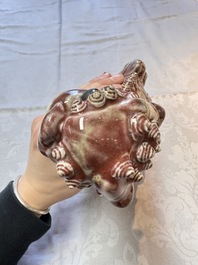 A Chinese copper-red-glazed Buddhist lion, 19th C.