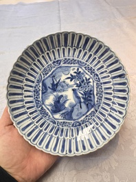 Four Chinese 'Kraak' blue and white plates with a bird on a rock, Wanli