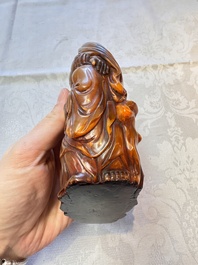 A Chinese carved buffalo horn 'Hehe Erxian' group, 17/18th C.