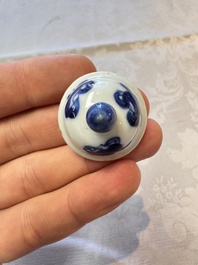 A Chinese blue and white vase, a pair of miniature vases, a covered teapot and a covered box, Kangxi and artemisia leaf mark, Kangxi
