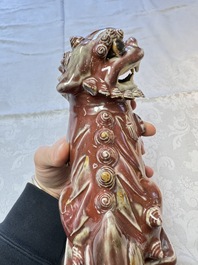 A Chinese copper-red-glazed Buddhist lion, 19th C.