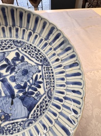 Four Chinese 'Kraak' blue and white plates with a bird on a rock, Wanli