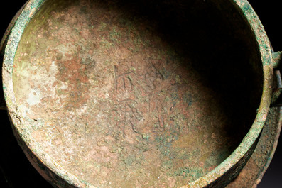 An inscribed Chinese archaic bronze food vessel and stand, You Pan Ding 有盤鼎, Western Zhou