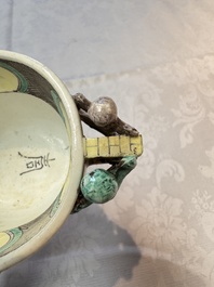 A pair of Chinese verte biscuit libation cups, 19th C.