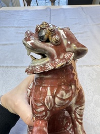 A Chinese copper-red-glazed Buddhist lion, 19th C.