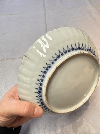 Four Chinese 'Kraak' blue and white plates with a bird on a rock, Wanli