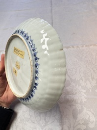 Four Chinese 'Kraak' blue and white plates with a bird on a rock, Wanli