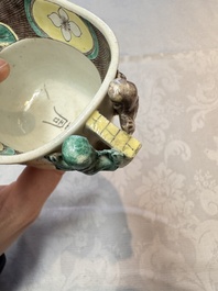 A pair of Chinese verte biscuit libation cups, 19th C.