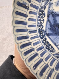 Four Chinese 'Kraak' blue and white plates with a bird on a rock, Wanli