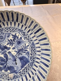 Four Chinese 'Kraak' blue and white plates with a bird on a rock, Wanli